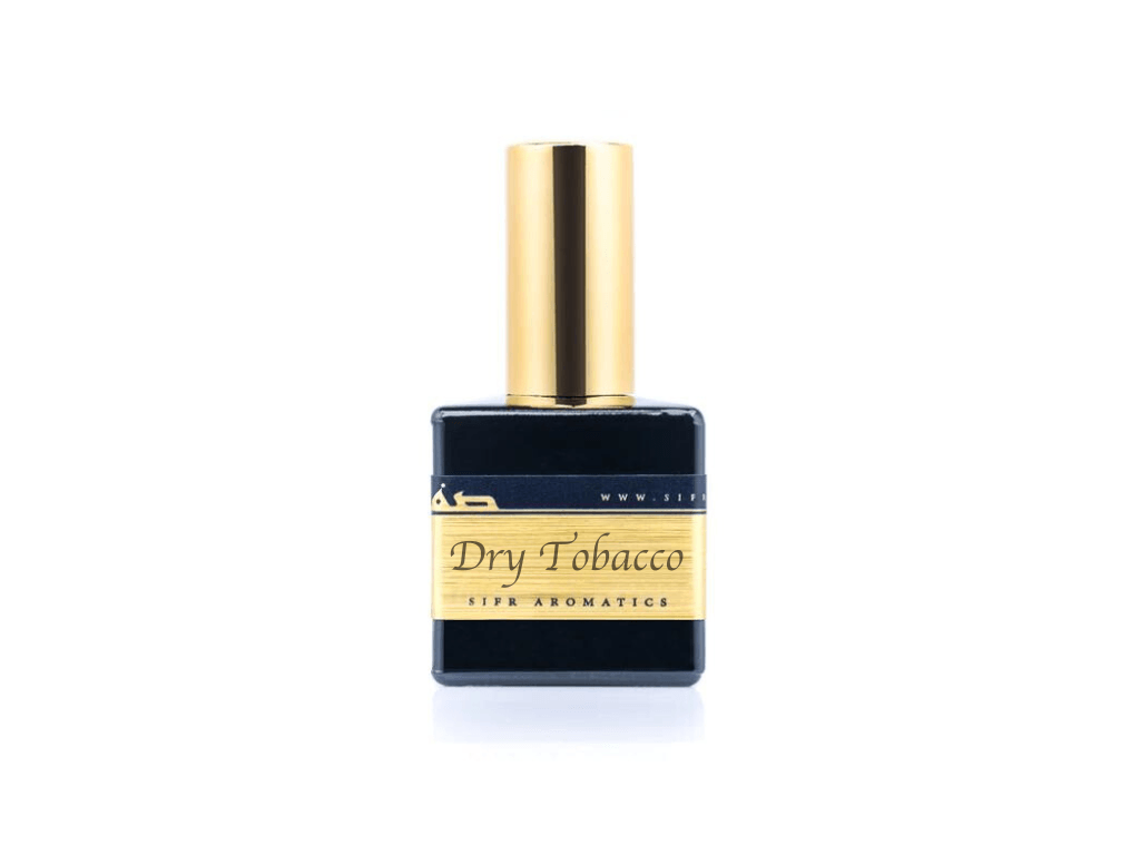 50ml spray bottle of Eau De Parfum placed elegantly on a white background. The bottle is sleek and black, with a polished gold cap. The label on the bottle is designed in gold and black, featuring Sifr Aromatics' logo and the perfume name 'Dry Tobacco' The overall aesthetic is clean and sophisticated, highlighting the high-quality craftsmanship of the product