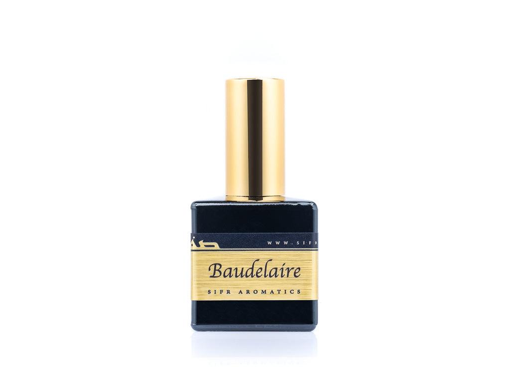 50ml spray bottle of Eau De Parfum placed elegantly on a white background. The bottle is sleek and black, with a polished gold cap. The label on the bottle is designed in gold and black, featuring Sifr Aromatics' logo and the perfume name 'Baudelaire.' The overall aesthetic is clean and sophisticated, highlighting the high-quality craftsmanship of the product